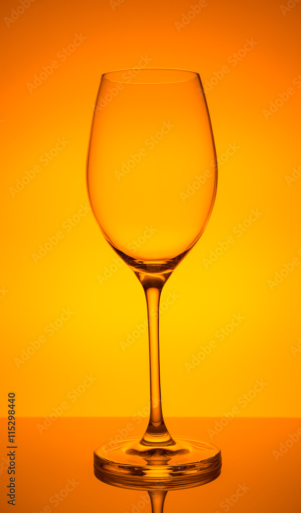 Glass with water on a yellow background Glass with water on a yellow background