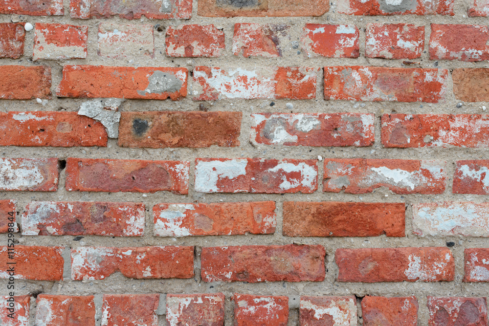 Fototapeta premium Brick texture with scratches and cracks