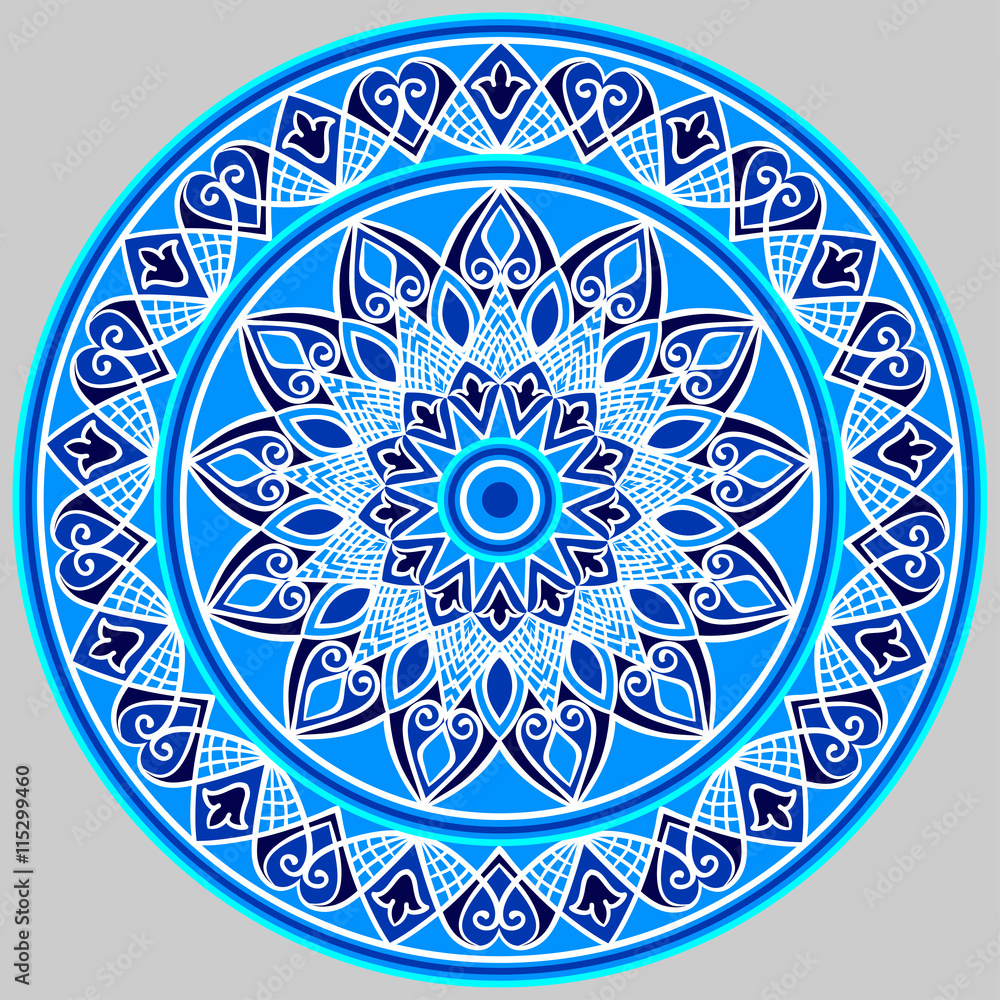 Drawing of a floral mandala in blue and white colors on a gray background