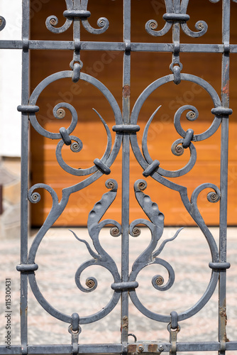 ornaments of wrought iron fence with gate
