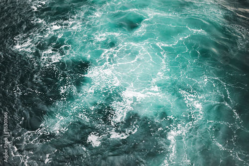 Blue stormy sea water surface background © evannovostro