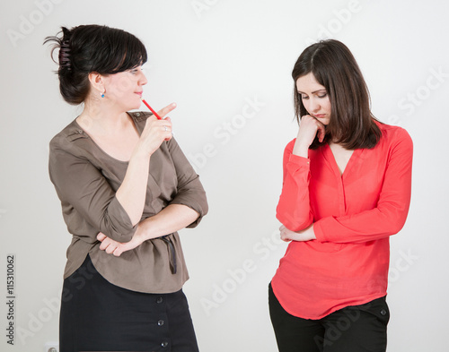 Photography Mature businesswoman speaking with her subordinate