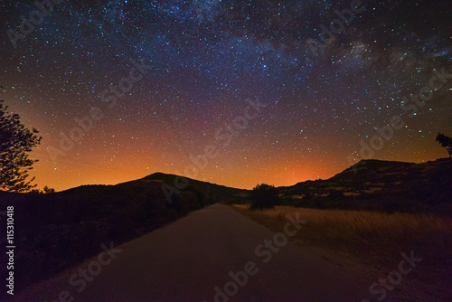 starry sky over a country road