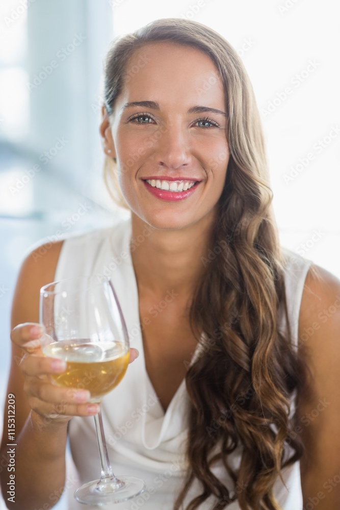 Portrait of smiling woman holding a beer glass Portrait of smiling woman holding a beer glass