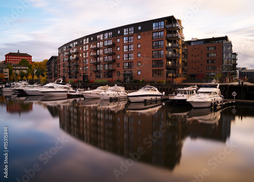 Horizontal vivid Norway yachts in city reflection background bac