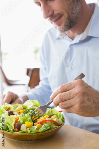 Man having food salad 