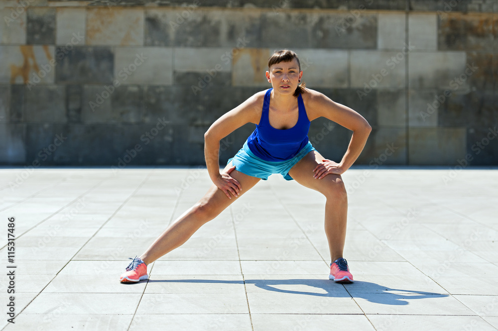 Woman stretching after, before jogging. Woman stretching after, before jogging.