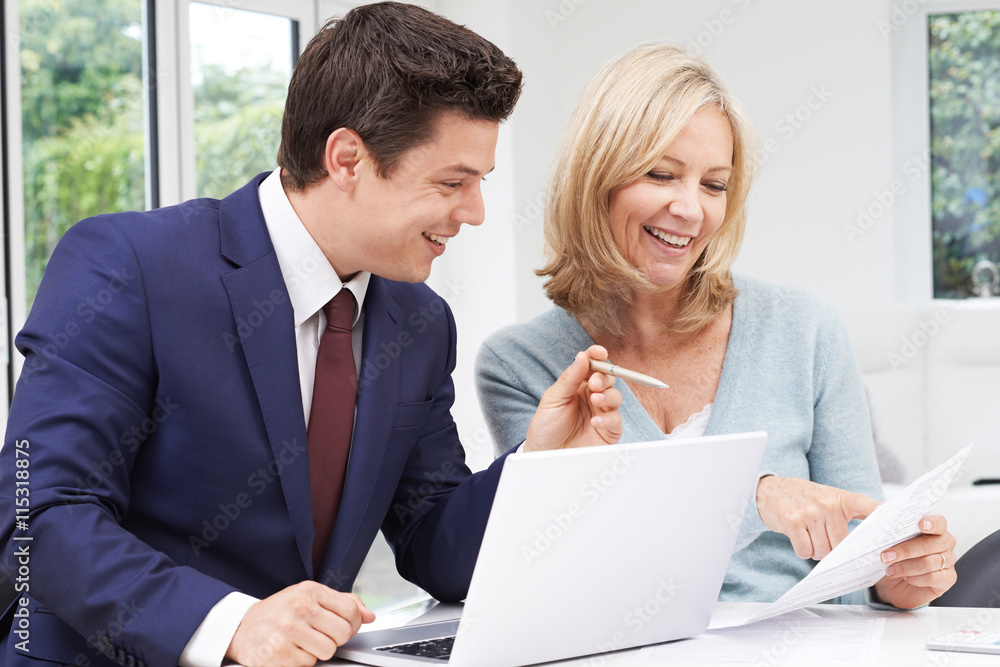 Mature Woman Meeting With Financial Advisor At Home Mature Woman Meeting With Financial Advisor At Home