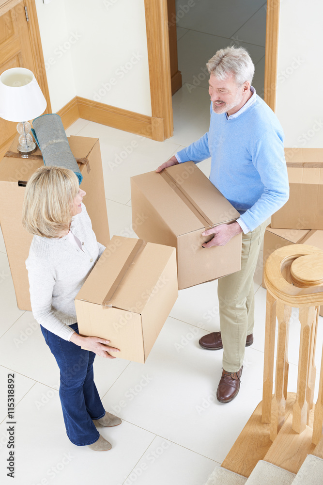 Mature Couple Moving In To New Home Mature Couple Moving In To New Home