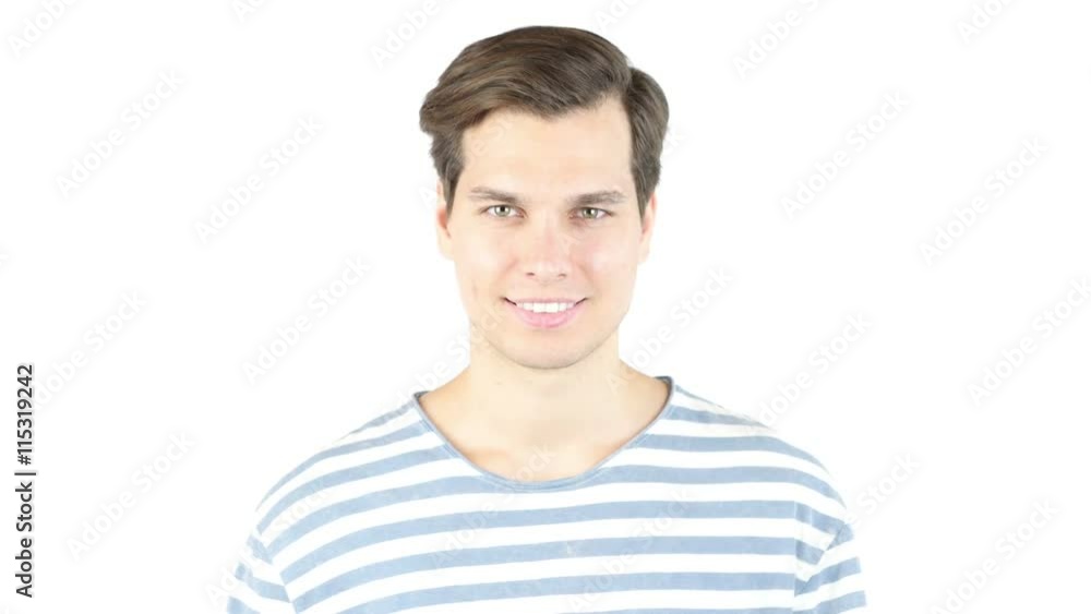 Closeup of happy smiling guy looking at camera isolated on white background Closeup of happy smiling guy looking at camera isolated on white background
