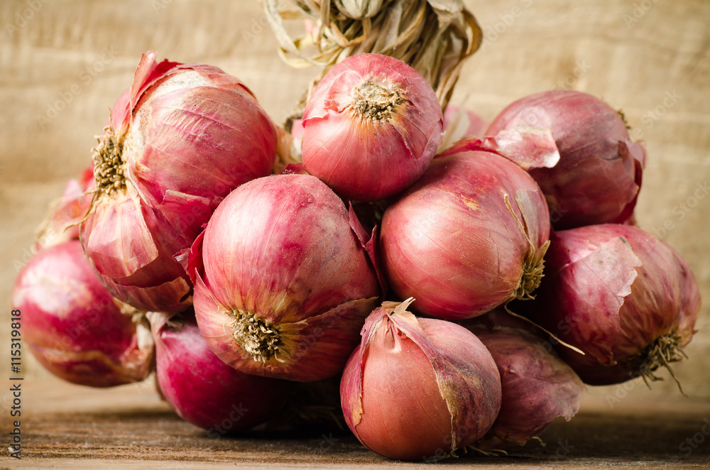 Fresh shallot on wooden background Fresh shallot on wooden background