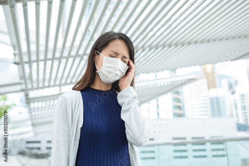 Woman feeling headache