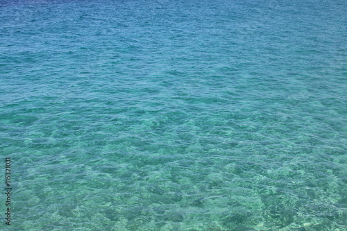 Blue sea water with waves and ripples. Sea background. Adriatic sea, Europe, Italy.