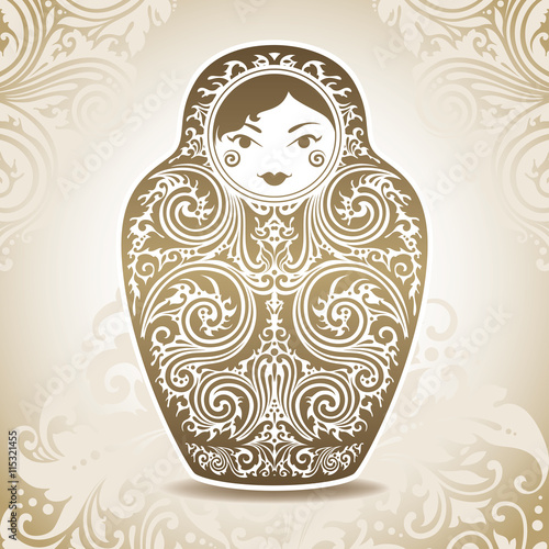 Ornamental doll on patterned background photo