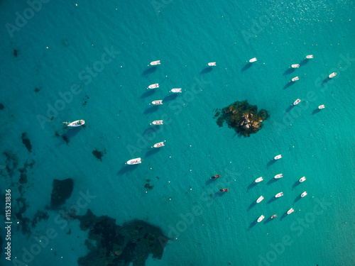 Aerial view of boats in a splendid cove in Corsica