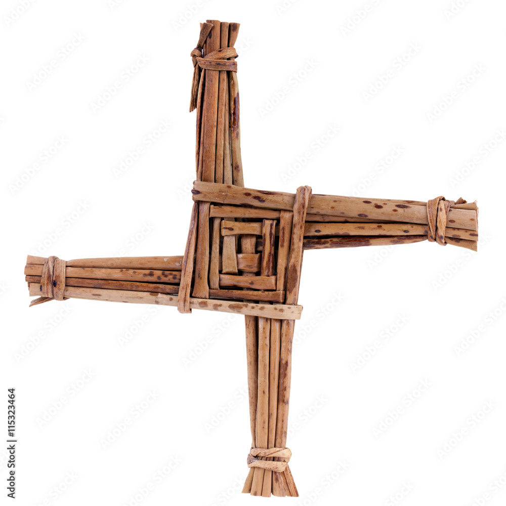Saint Brigid's cross made from  straw isolated on white. 1 February is St. Brigid's feast day.  Brigid's Cross blessed the house and  protected it from fire and evil - obrazy, fototapety, plakaty 