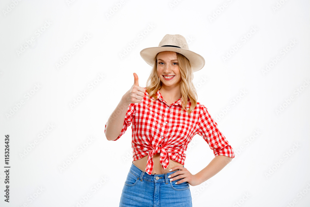 Portrait of beautiful country girl showing okay over white background. Portrait of beautiful country girl showing okay over white background.