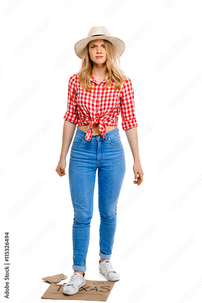 Portrait of beautiful country girl hitchhiking over white background. Portrait of beautiful country girl hitchhiking over white background.