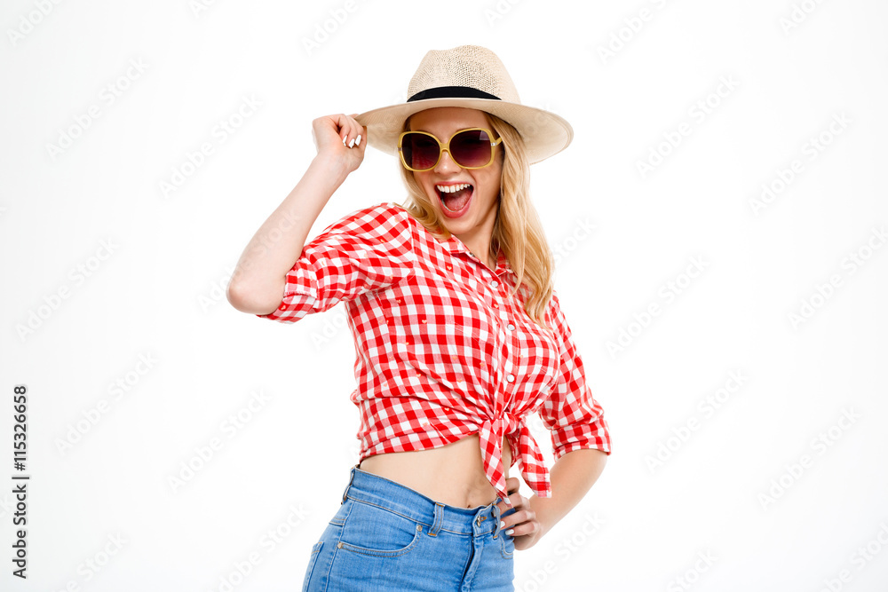 Portrait of young beautiful country girl over white background. Portrait of young beautiful country girl over white background.