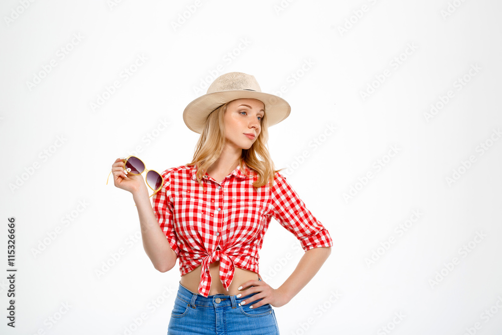 Portrait of young beautiful country girl over white background. Portrait of young beautiful country girl over white background.