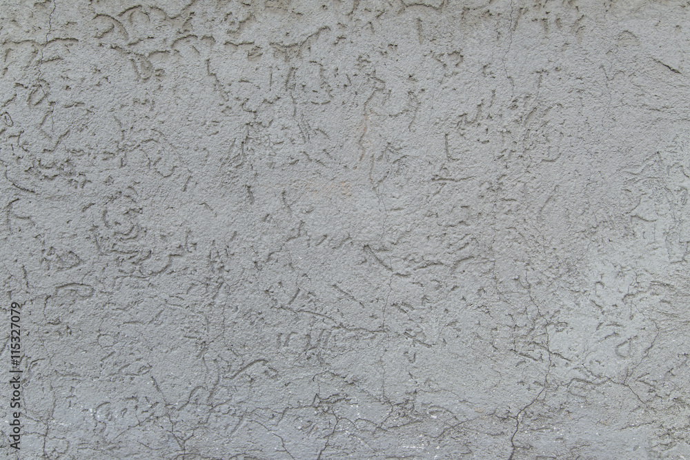 Grey rugged plaster as background texture Grey rugged plaster as background texture