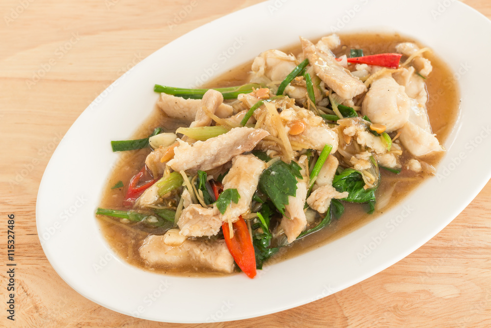 Stir-fried fish with Chinese celery in white dish (Thai food) Stir-fried fish with Chinese celery in white dish (Thai food)