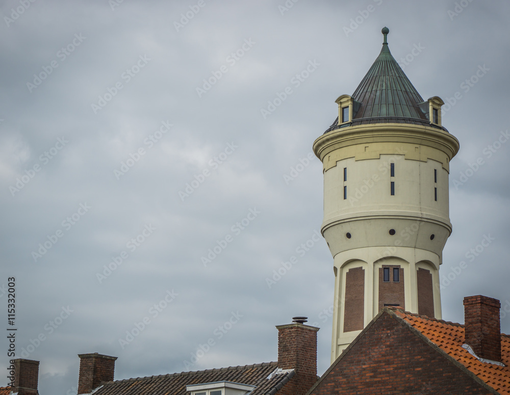 city water tower on a cloudy day right side