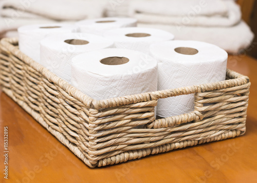 Toilet paper rolls on basket