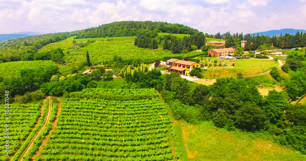 Fototapeta premium Aerial view of Tenuta Coffele, an old farmhouse in the hills aro
