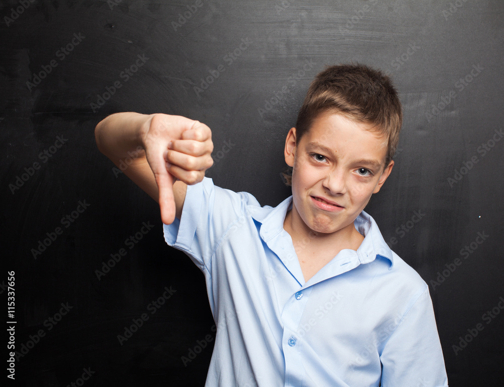Boy near blackboard Boy near blackboard