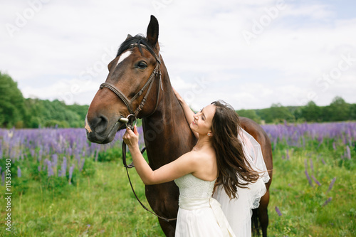The bride with horse on the field
