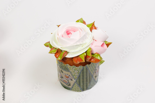 small cake with cream flowers