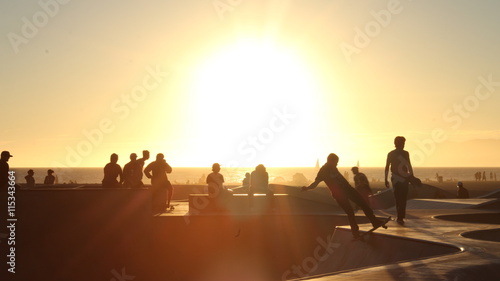 silhouette of  skaters
