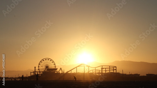 Ferris wheel at sunset (ID: 115343681)