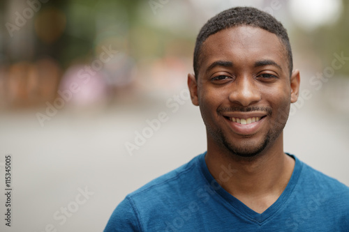 Young black man in city smile happy face