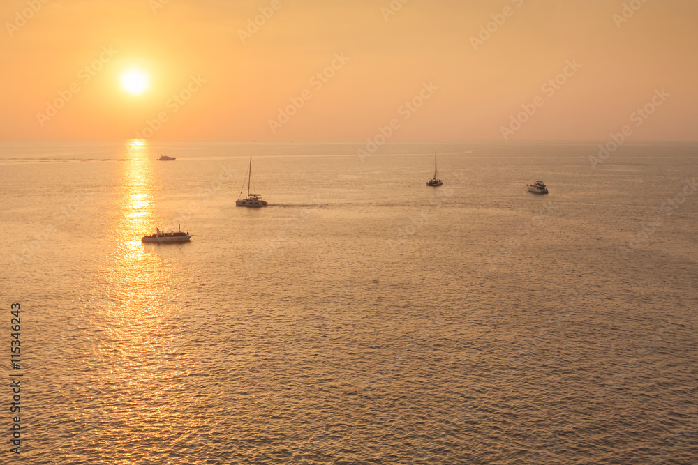 Yacht in the tropical sea at sunset. Yacht in the tropical sea at sunset.