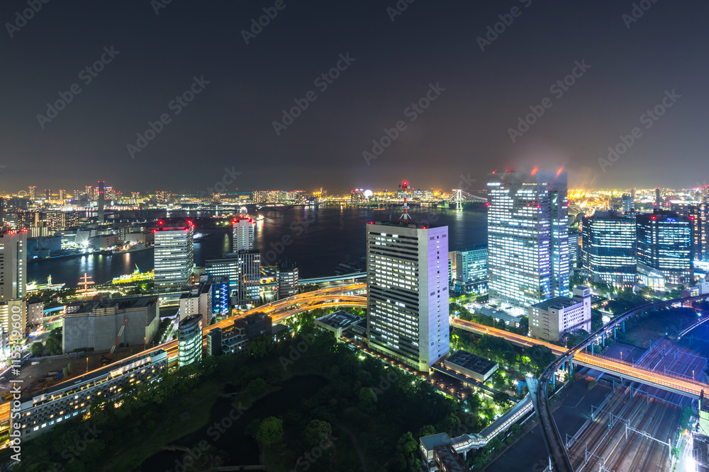 Fototapeta premium modern office buildings in downtown of tokyo at twilight