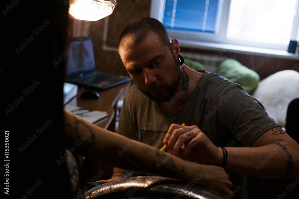 Tattoo artist makes scetch Tattoo artist makes scetch