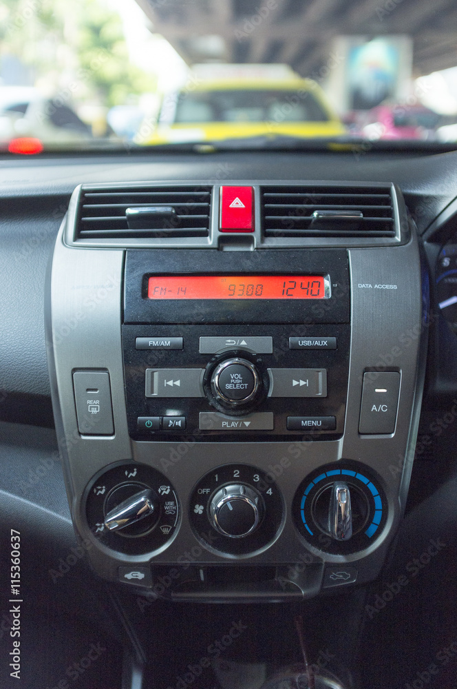 Fototapeta premium Inside view of front dashboard panel of car interior