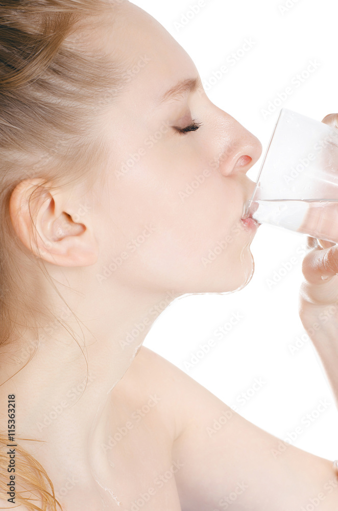 young woman drinking water, on white background young woman drinking water, on white background