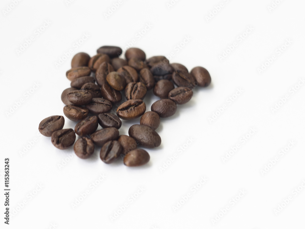 Naklejka premium coffee beans on white isolated background