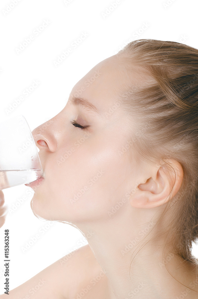 young woman drinking water, on white background young woman drinking water, on white background