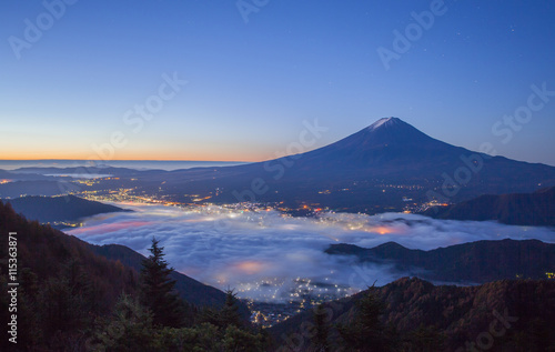 Mountain Fuji and sea of mist above Kawaguchiko lake in morning autumn season © torsakarin