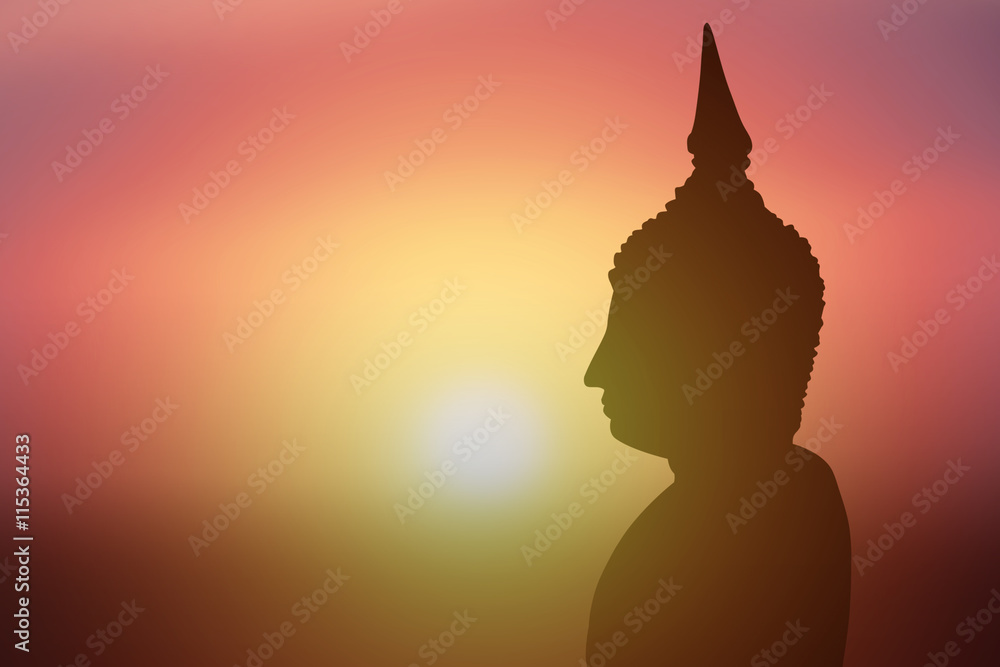 Silhouette of Buddha.Background sunrise