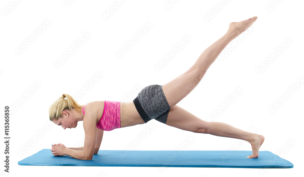 Woman doing stretching exercises.. Woman doing stretching exercises..