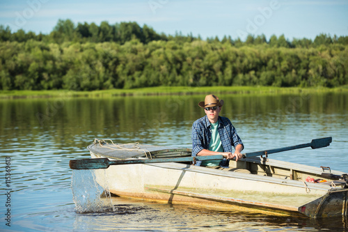 fisherman boat river