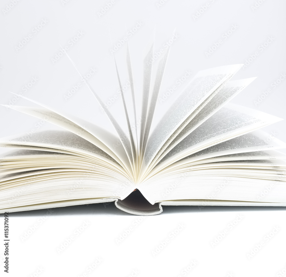 Fototapeta premium Book opened up against pure white background