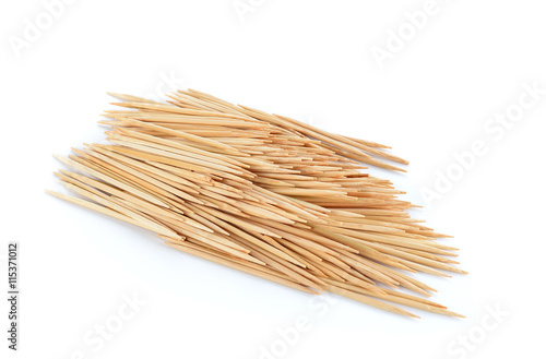 Pile of wooden toothpicks isolated on white. Bunch of toothpicks