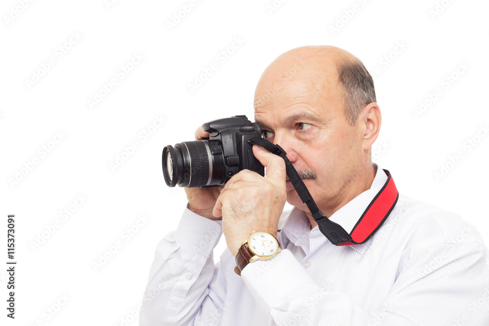 elderly man tries to understand the complex camera settings elderly man tries to understand the complex camera settings