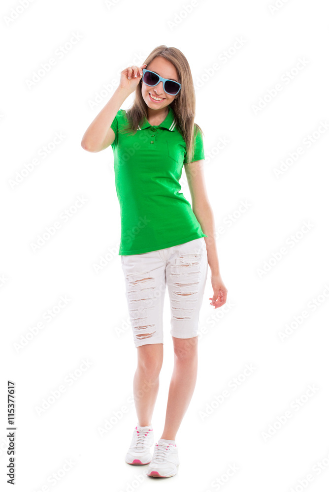 Beautiful brunette girl in sunglasses isolated on white background. Sexy young woman posing in the studio. Beautiful brunette girl in sunglasses isolated on white background. Sexy young woman posing in the studio.